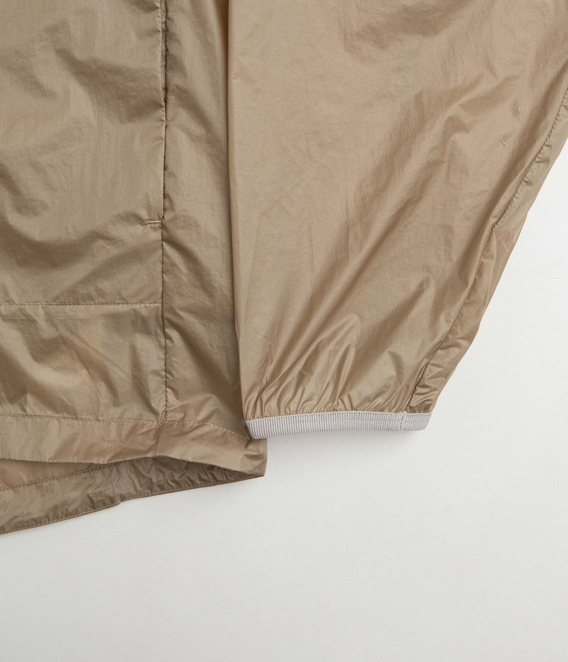 Nike ACG Cinder Cone Windproof Jacket in Khaki and Summit White