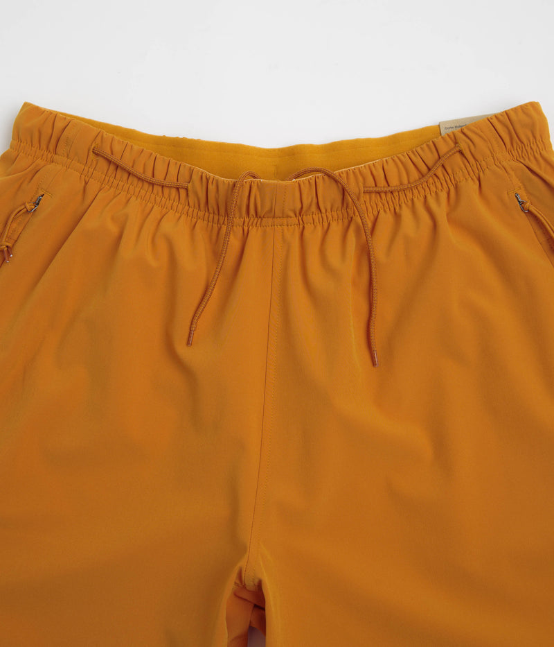 Nike ACG New Sands Shorts in Monarch and Dark Russet / Summit White
