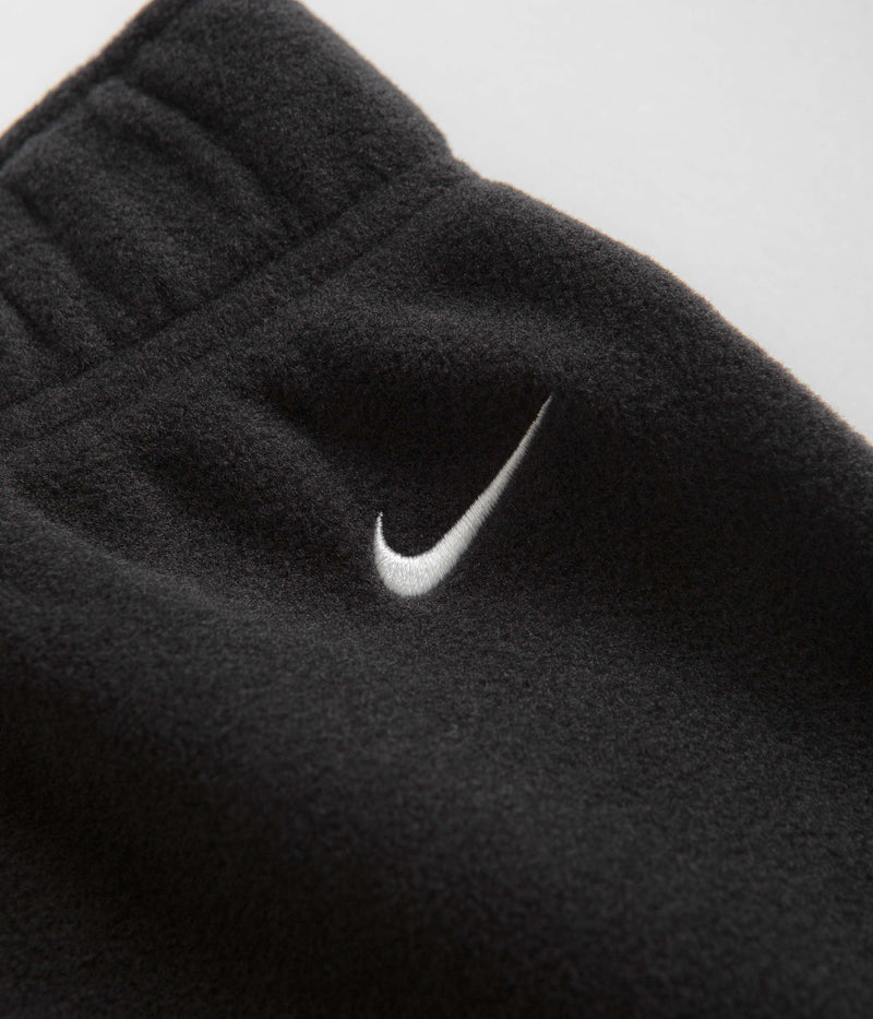 Nike ACG Polartec Wolf Tree Pants in Black and Black / Summit White