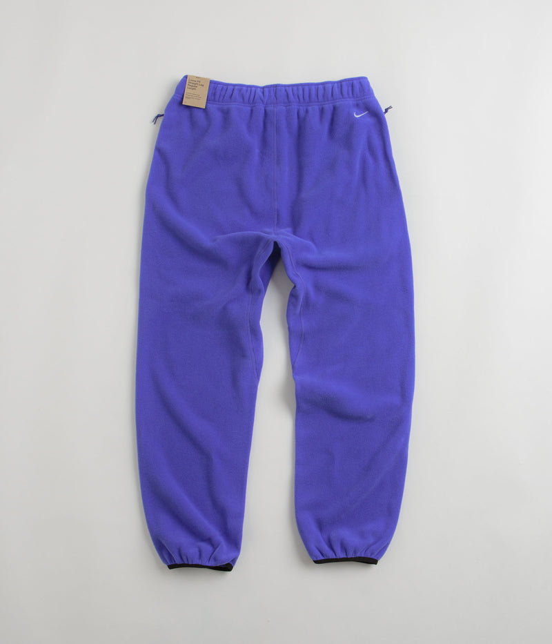 Nike ACG Polartec Wolf Tree Pants in Persian Violet and Summit White