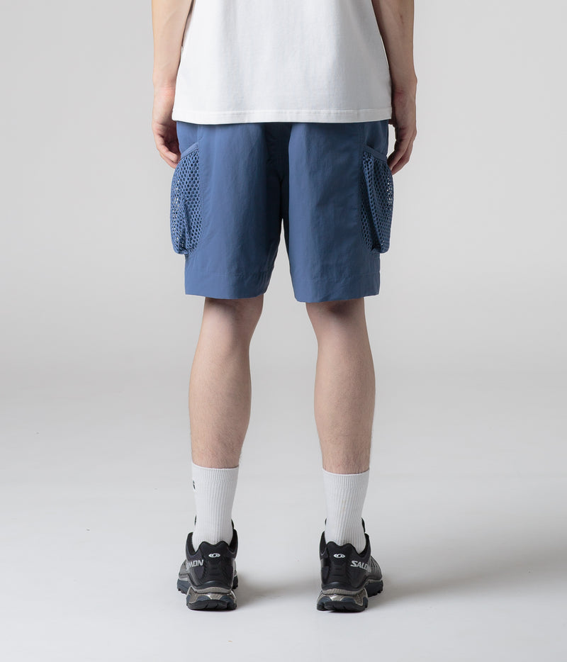 Nike ACG Snowgrass Cargo Shorts in Diffused Blue and Summit White