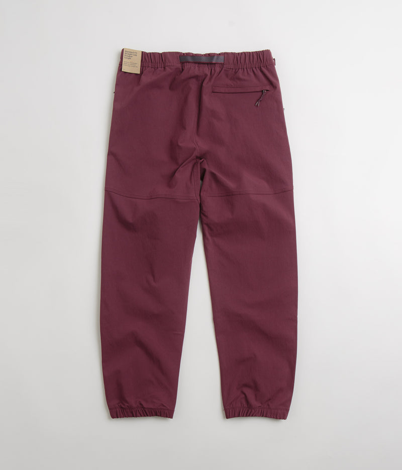 Nike ACG Trail Pants in Night Maroon and Deep Jungle / Summit White