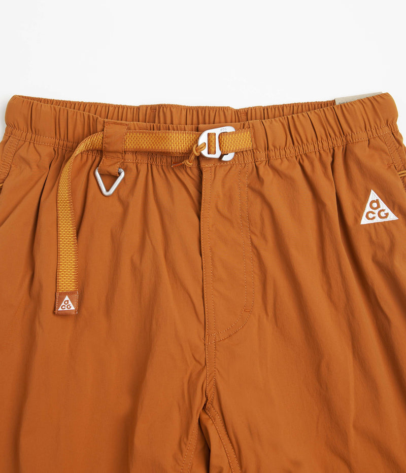 Nike ACG Trail Zip-Off Pants in Dark Russet and Monarch / Summit White