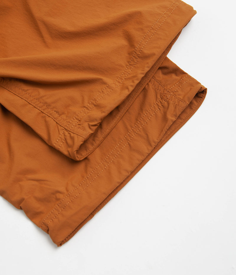 Nike ACG Trail Zip-Off Pants in Dark Russet and Monarch / Summit White