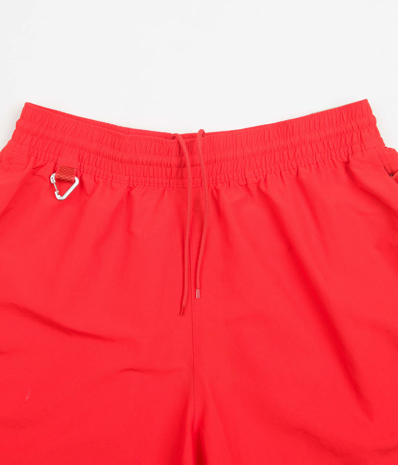 Nike ACG Womens Oversized Shorts in Light Crimson and Cinnabar / Mars Stone