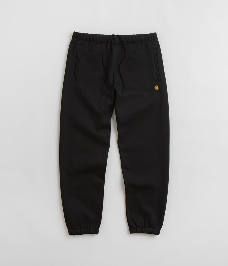 Carhartt Chase Sweatpants in Black and Gold / Black