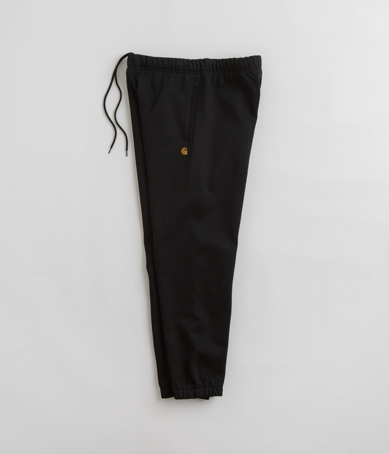Carhartt Chase Sweatpants in Black and Gold / Black