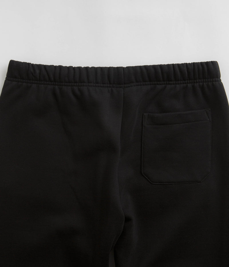 Carhartt Chase Sweatpants in Black and Gold / Black