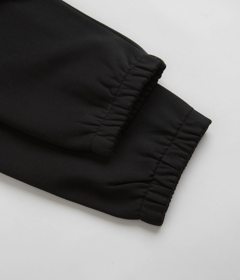 Carhartt Chase Sweatpants in Black and Gold / Black