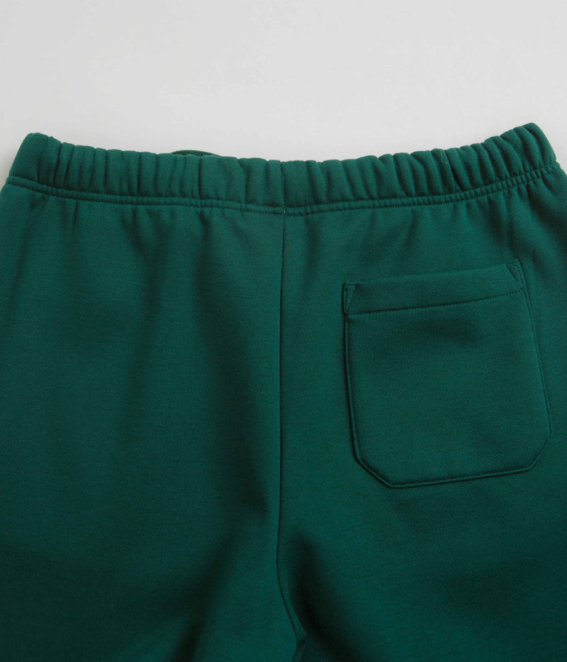 Carhartt Chase Sweatpants in Chervil and Gold