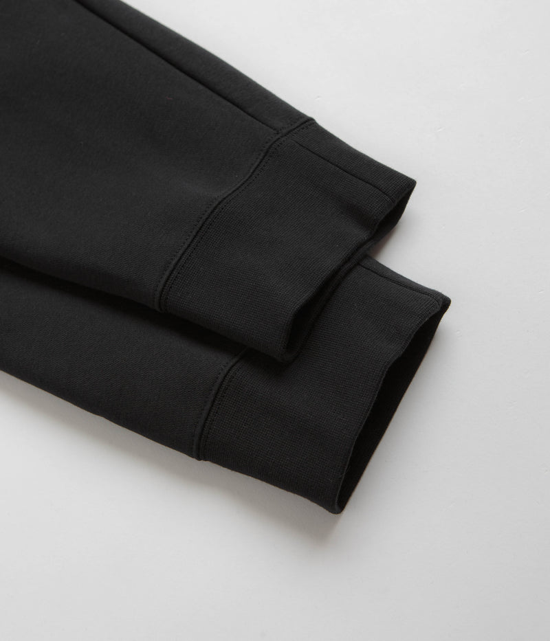 Nike Club Fleece Joggers in Black and Black / White
