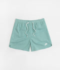 Nike Flow Shorts in Mineral and White