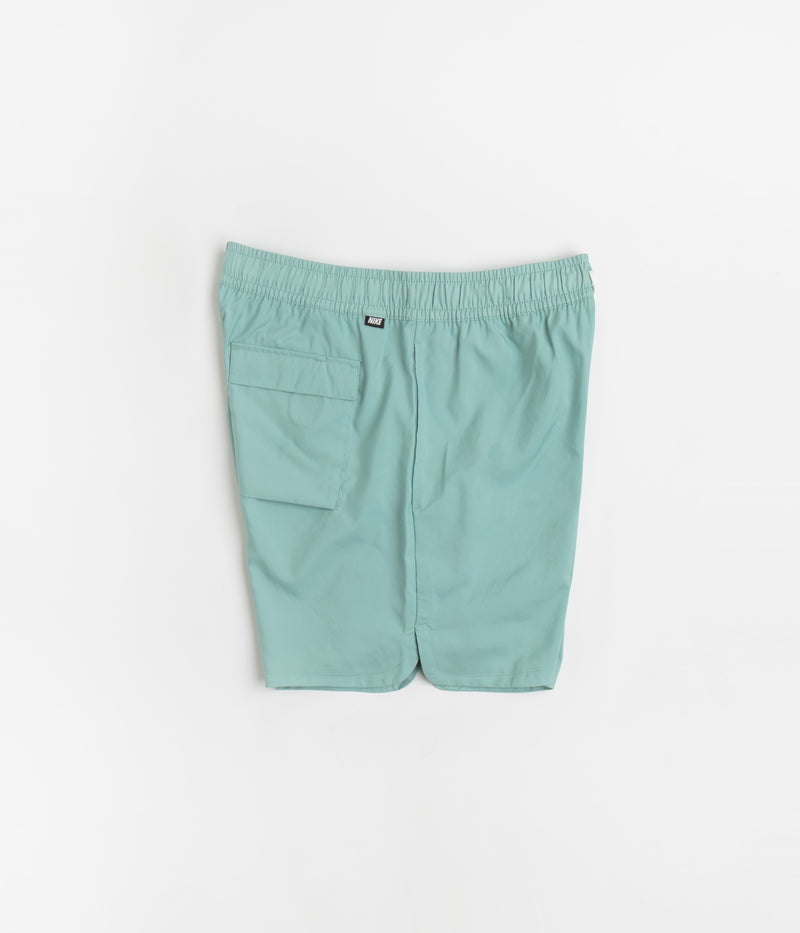 Nike Flow Shorts in Mineral and White