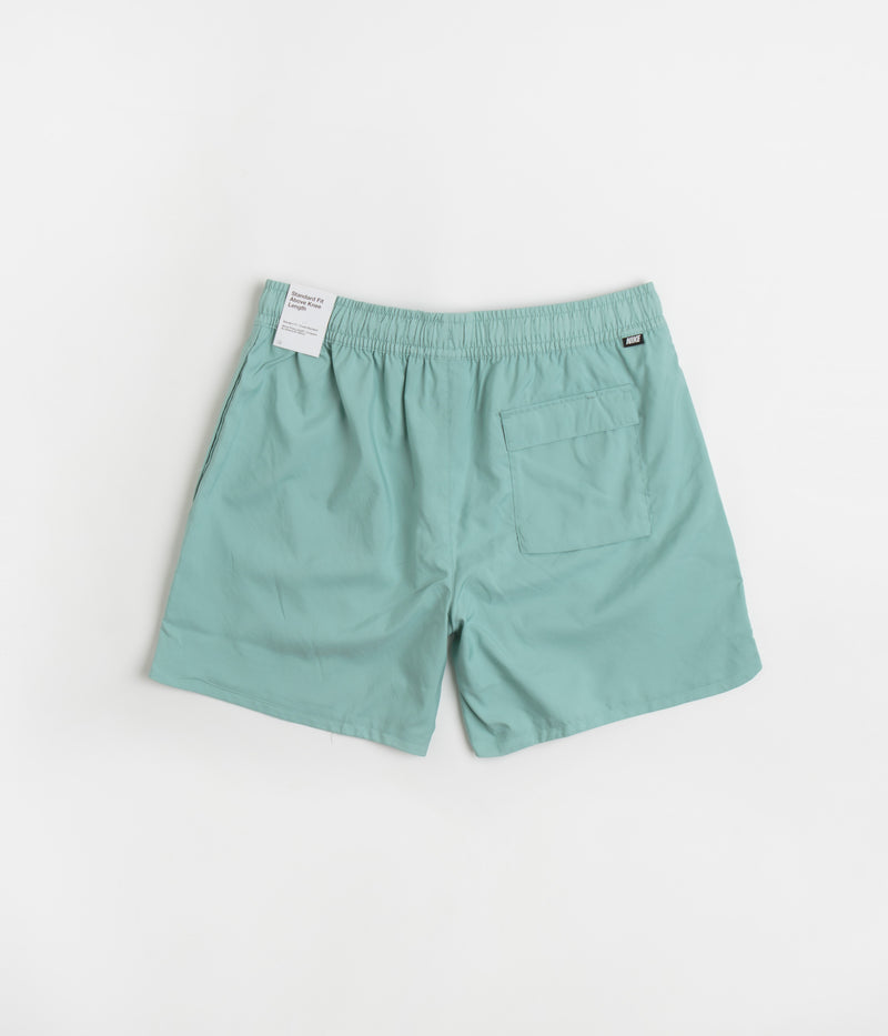 Nike Flow Shorts in Mineral and White