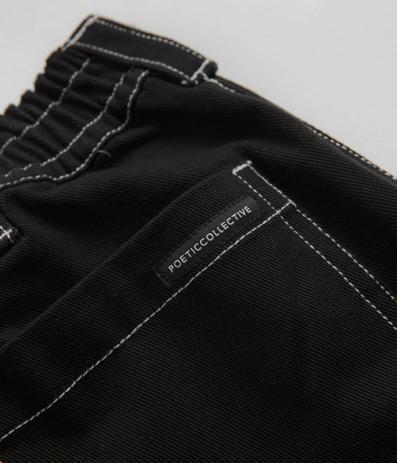 Poetic Collective Denim Sculptor Pants in Black and White Stitch