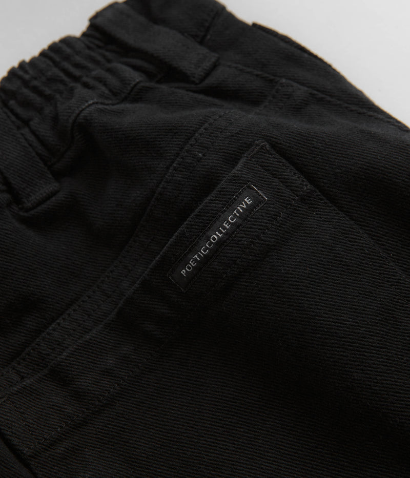 Poetic Collective Denim Tapered Pants in Black
