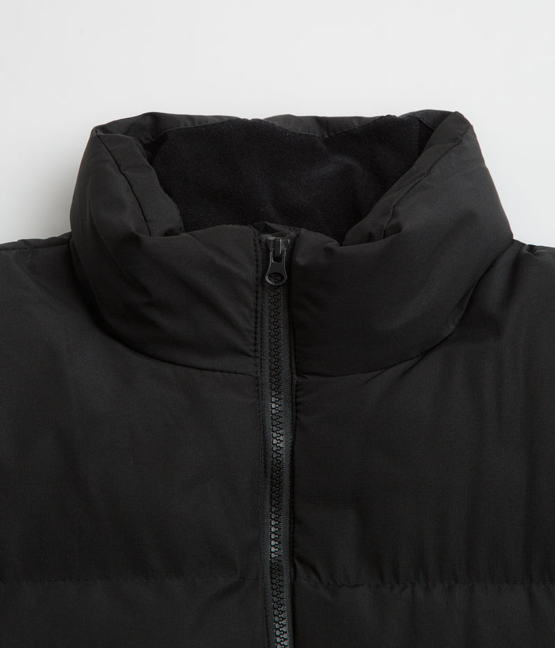Poetic Collective Puffer Jacket in Black and White