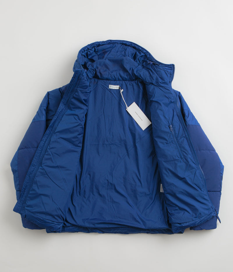 Pop Trading Company Puffer Jacket in Sodalite Blue