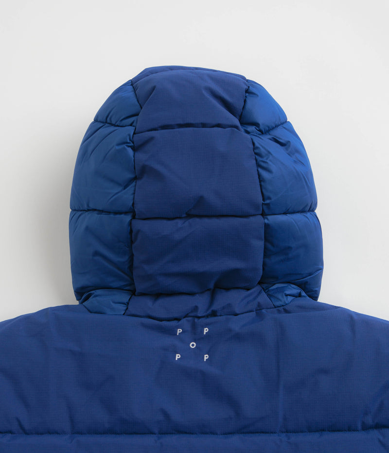 Pop Trading Company Puffer Jacket in Sodalite Blue