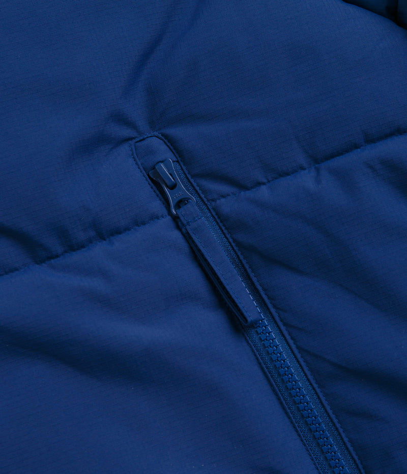 Pop Trading Company Puffer Jacket in Sodalite Blue