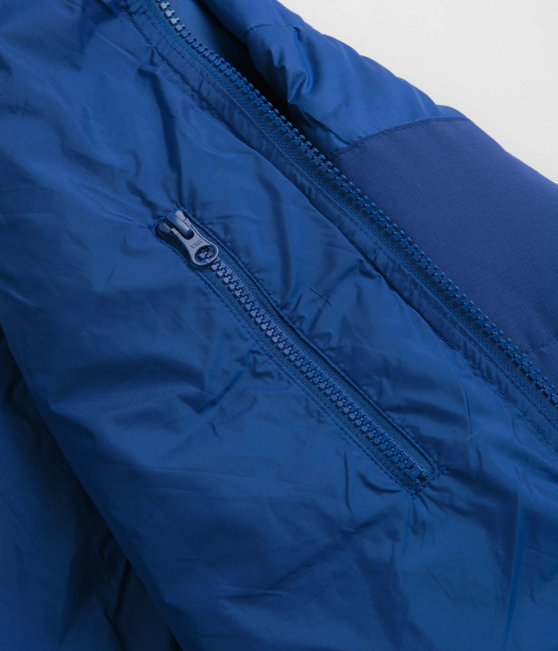 Pop Trading Company Puffer Jacket in Sodalite Blue
