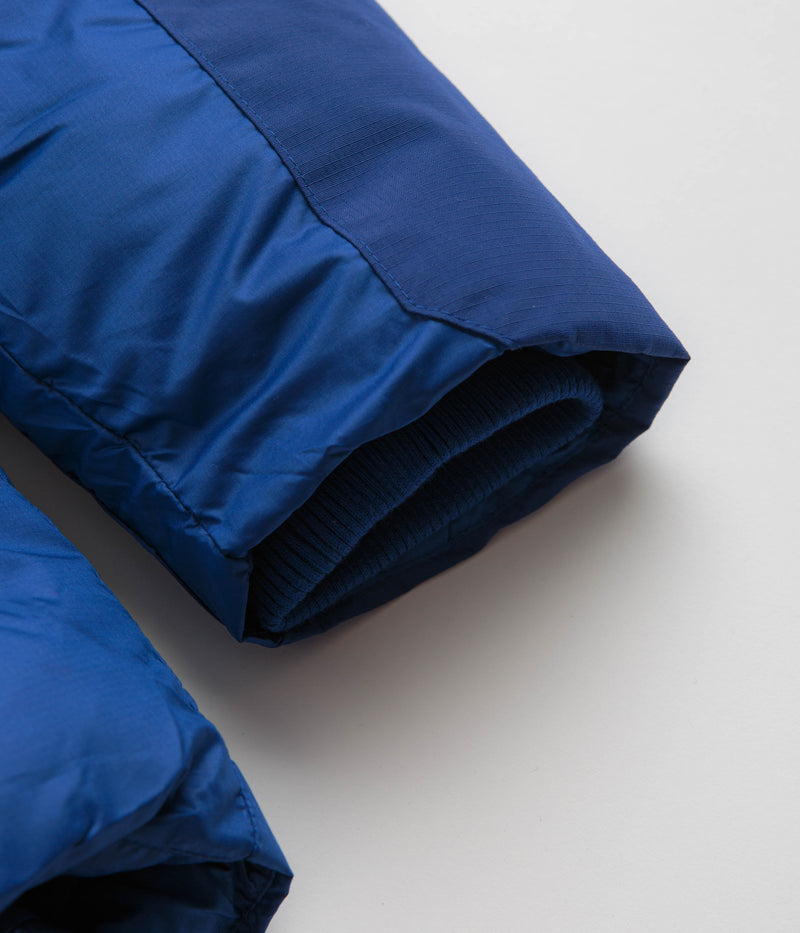Pop Trading Company Puffer Jacket in Sodalite Blue