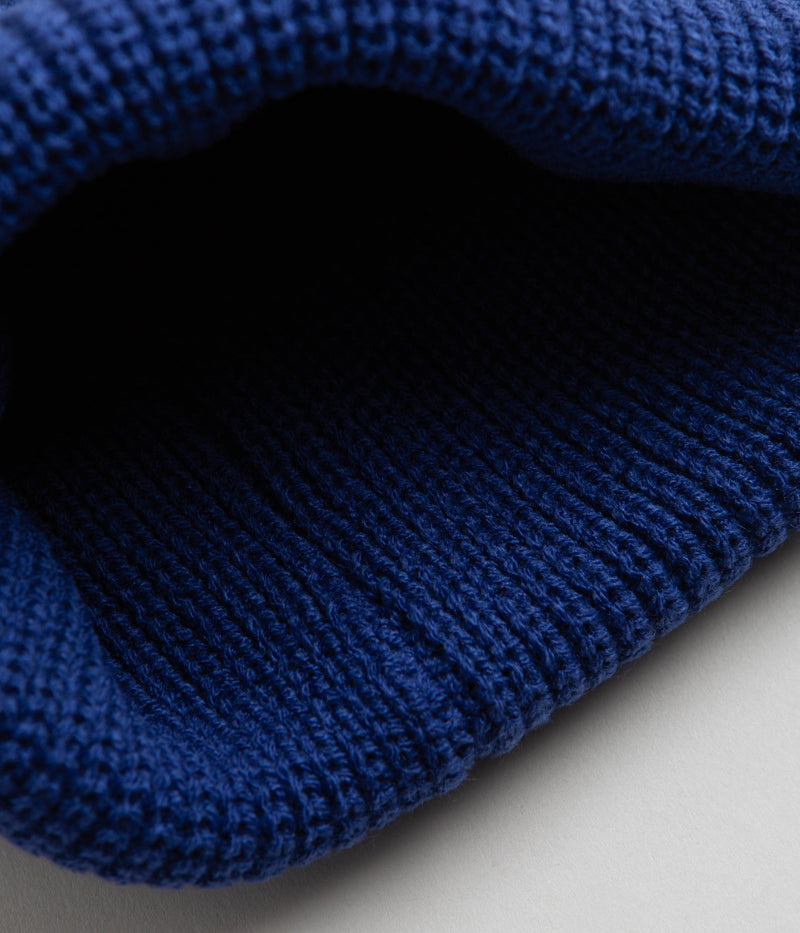 Pop Trading Company Striped Beanie in Blue
