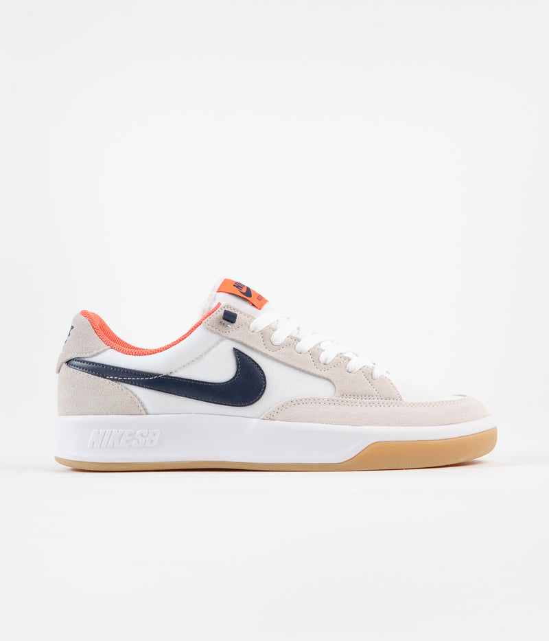 Nike SB Adversary Premium Shoes in White and Midnight Navy and Turf Orange