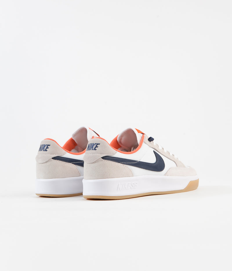 Nike SB Adversary Premium Shoes in White and Midnight Navy and Turf Orange
