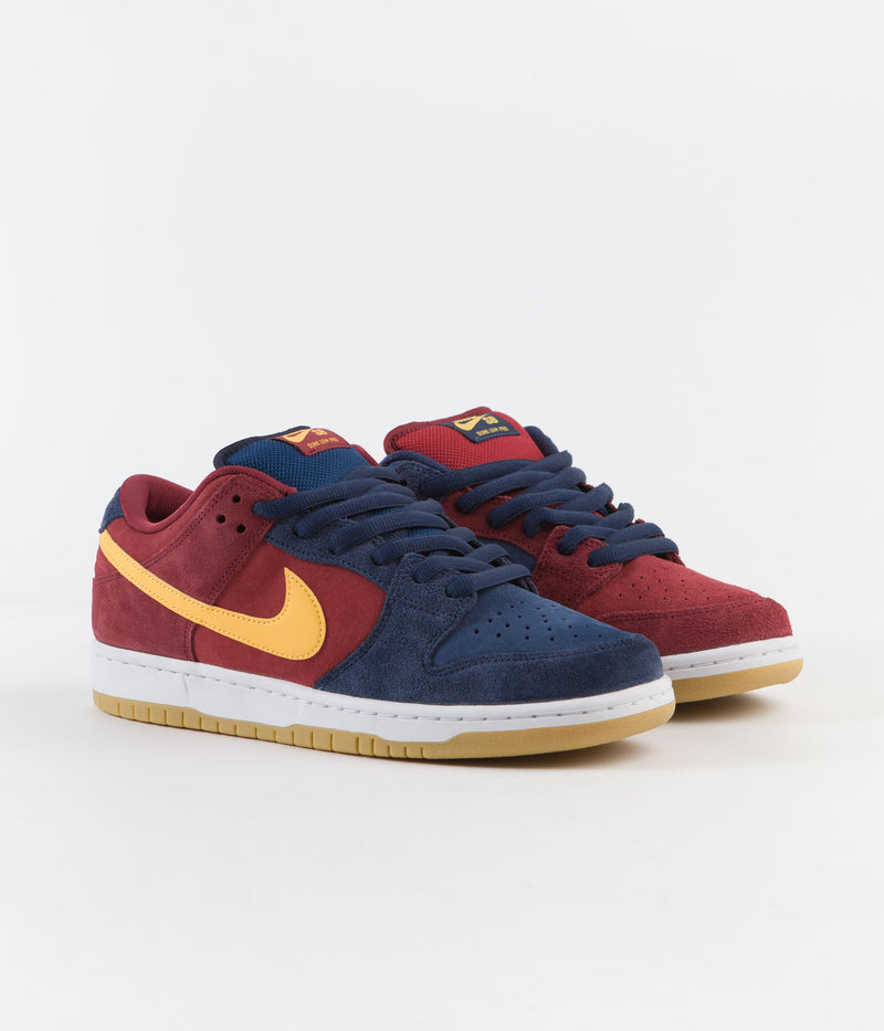Nike SB Dunk Low Pro 'Barcelona' Shoes in Navy and University Gold and Gym Red - Court Blue