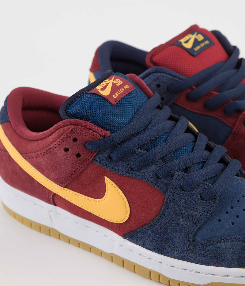 Nike SB Dunk Low Pro 'Barcelona' Shoes in Navy and University Gold and Gym Red - Court Blue