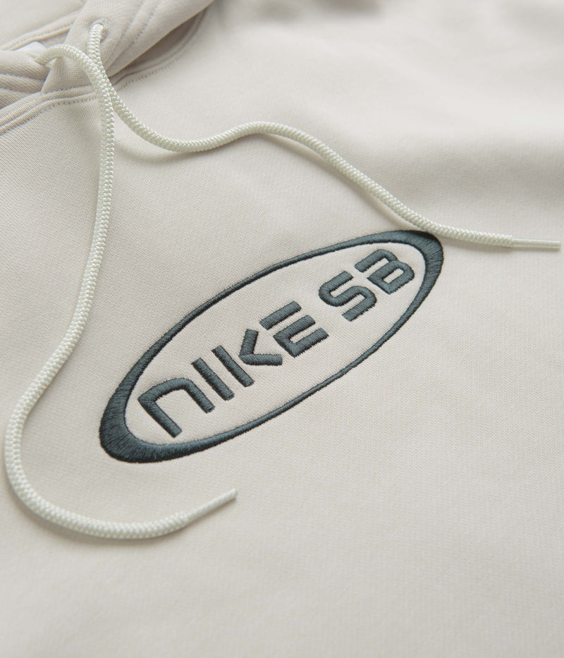 Nike SB Embroidered Graphic Hoodie in Light Bone and Deep Jungle