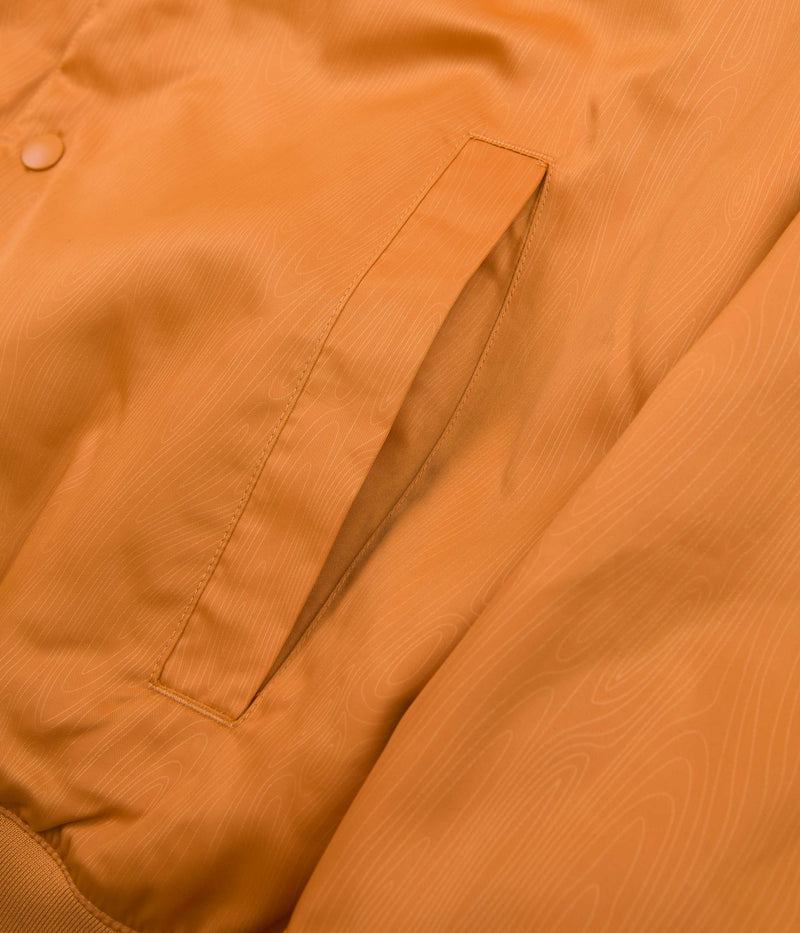 Nike SB Orange Label Storm-FIT Bomber Jacket in Light Curry