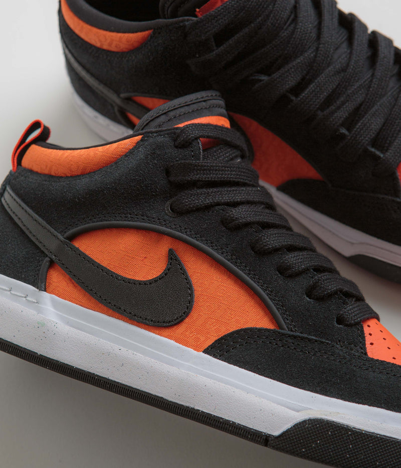 Nike SB React Leo Shoes in Black and Black and Orange - Electro Orange