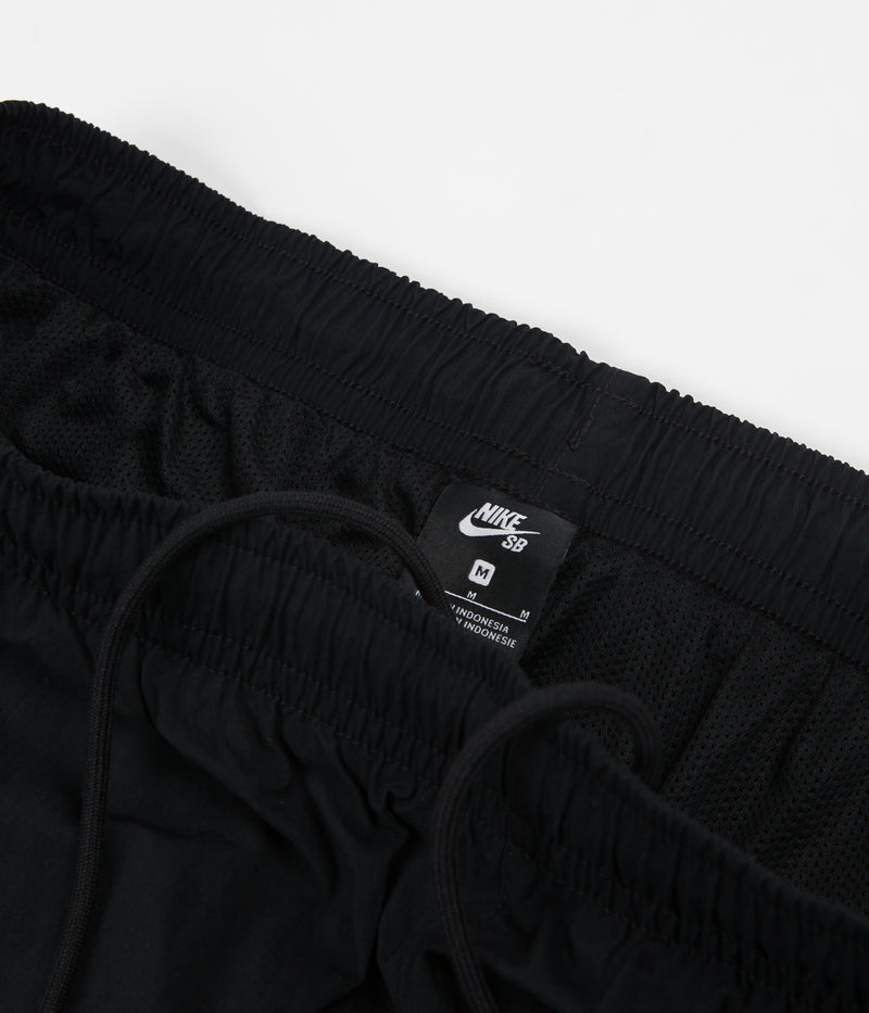 Nike SB Swoosh Track Pants in Black and White / White