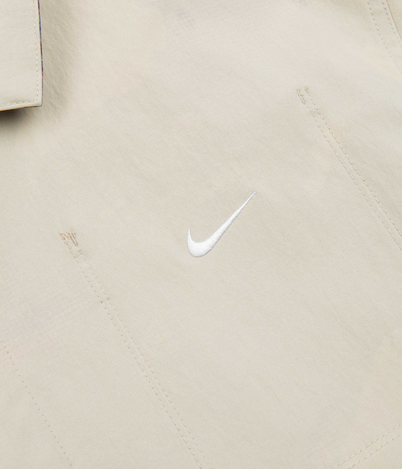 Nike SB x Doyenne  Reversible Jacket in Limestone and White