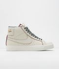 Nike SB x Welcome Skateboarding Blazer Mid Shoes in Sail and Dark Beetroot and White