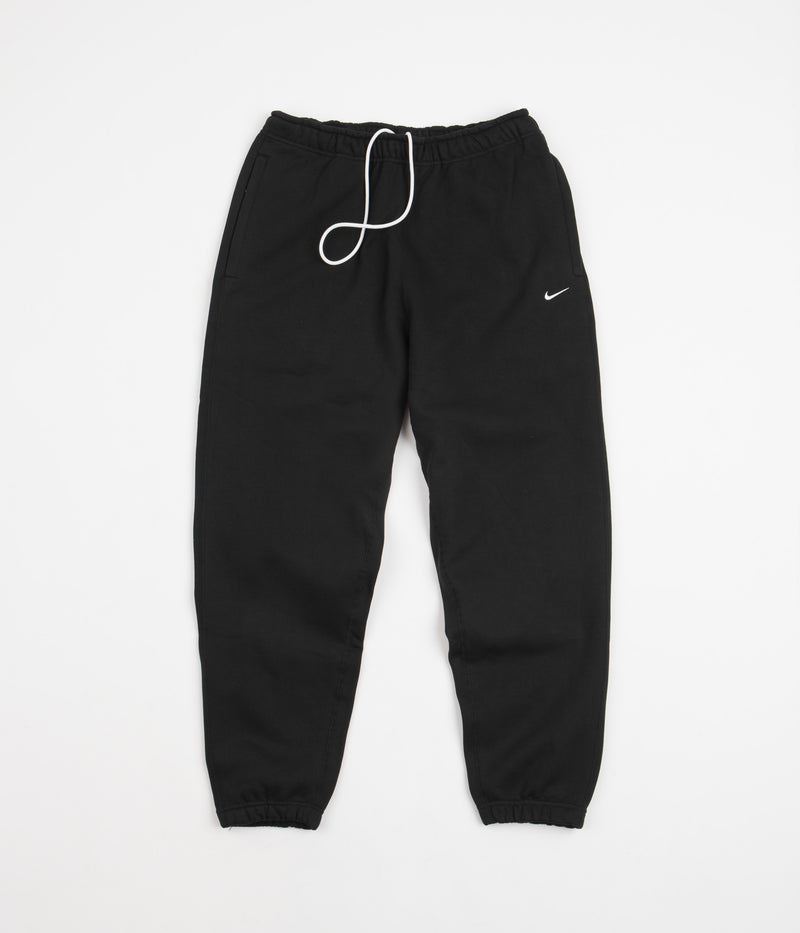 Nike Solo Swoosh Fleece Sweatpants in Black and White