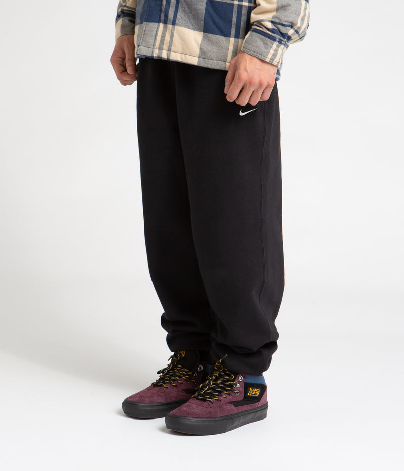 Nike Solo Swoosh Fleece Sweatpants in Black and White