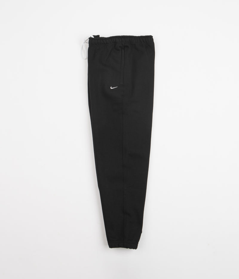 Nike Solo Swoosh Fleece Sweatpants in Black and White