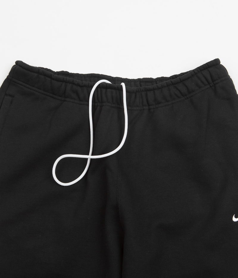 Nike Solo Swoosh Fleece Sweatpants in Black and White