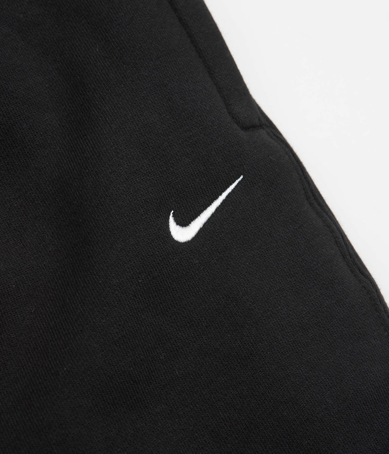 Nike Solo Swoosh Fleece Sweatpants in Black and White