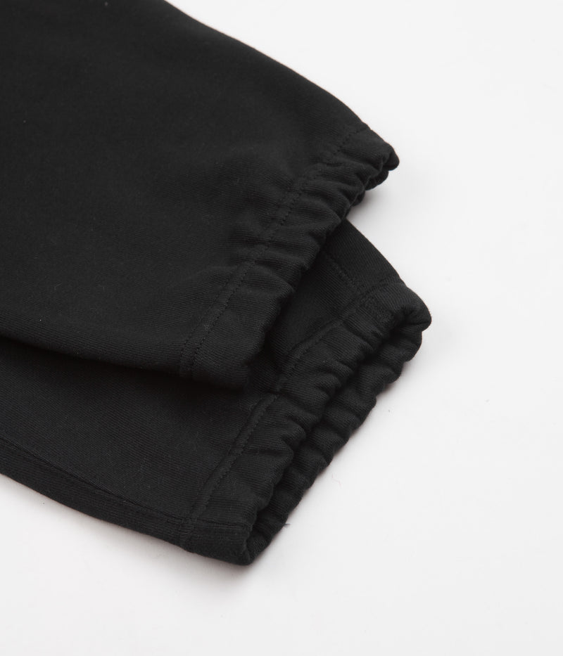 Nike Solo Swoosh Fleece Sweatpants in Black and White