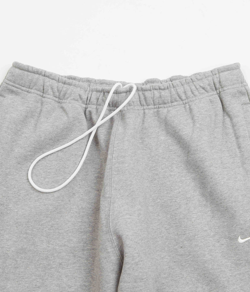 Nike Solo Swoosh Fleece Sweatpants in Dark Grey Heather and White