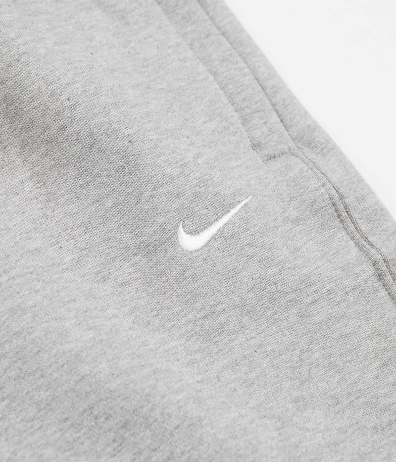 Nike Solo Swoosh Fleece Sweatpants in Dark Grey Heather and White