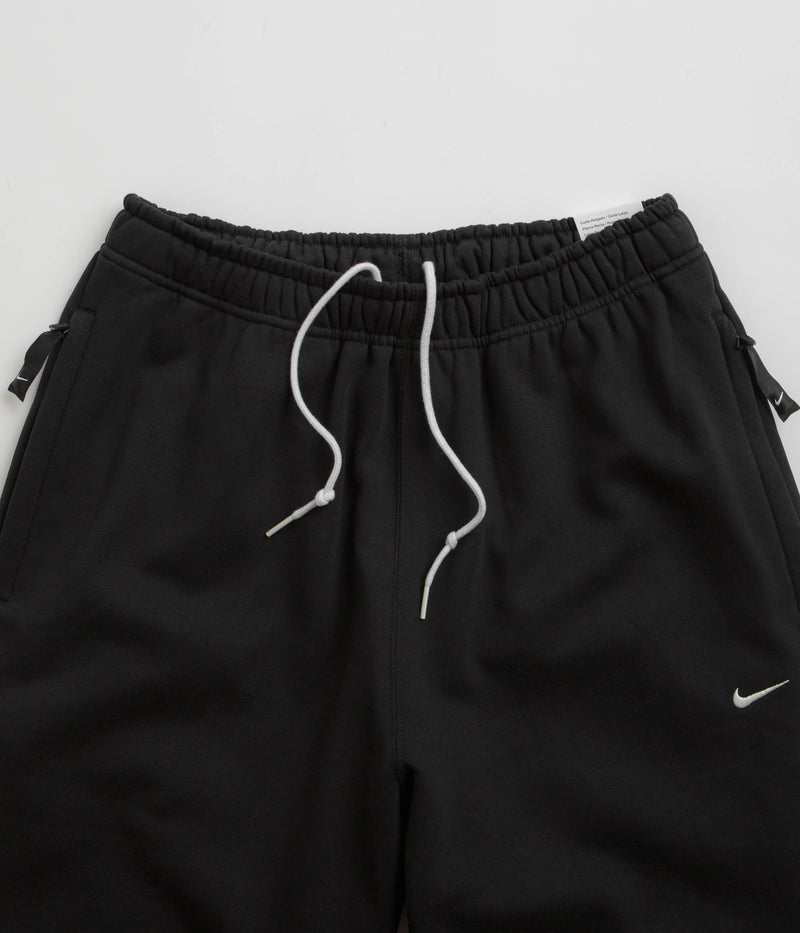 Nike Solo Swoosh Sweatpants in Black and White