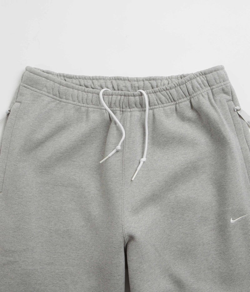 Nike Solo Swoosh Sweatpants in Dark Grey Heather and White