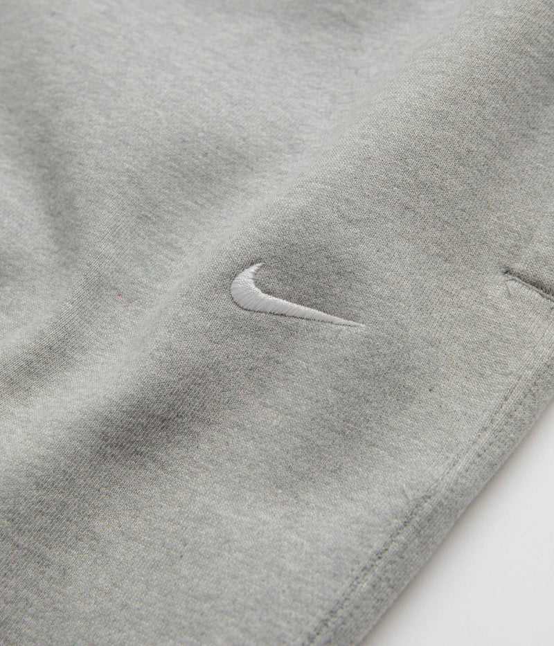 Nike Solo Swoosh Sweatpants in Dark Grey Heather and White
