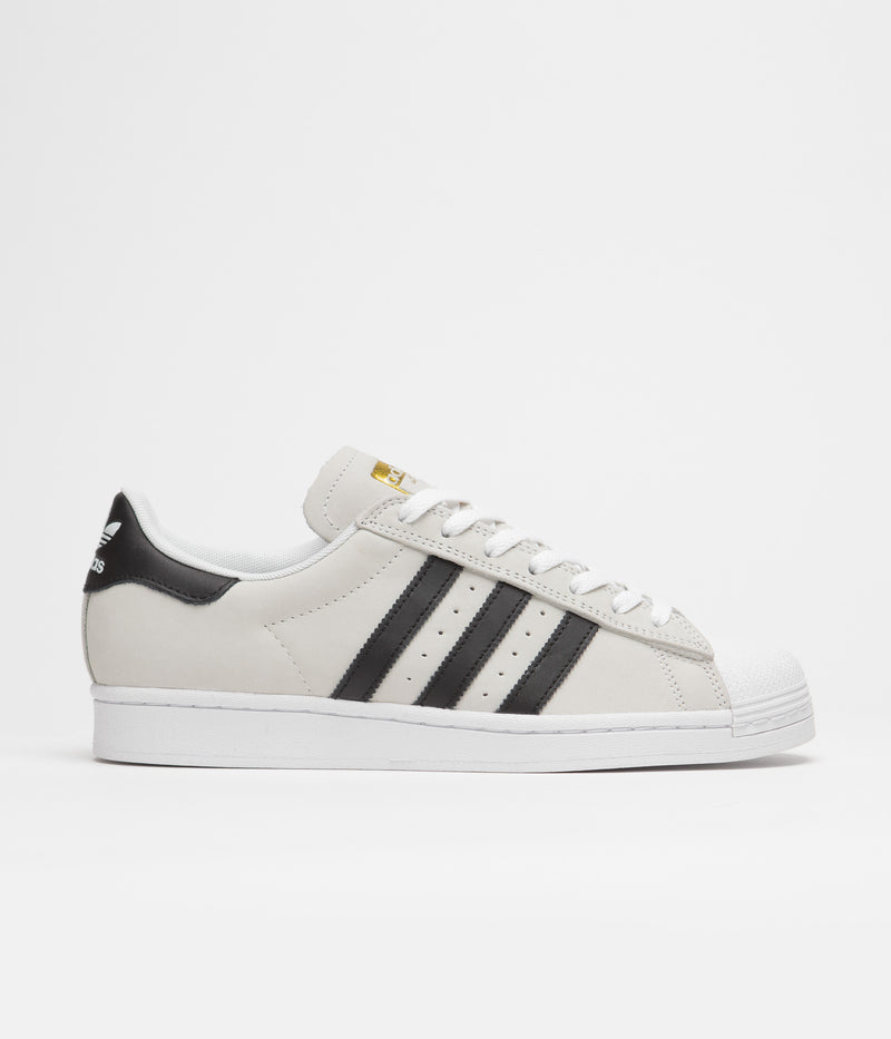 Adidas Superstar Shoes in White and Core Black / Gold Metallic