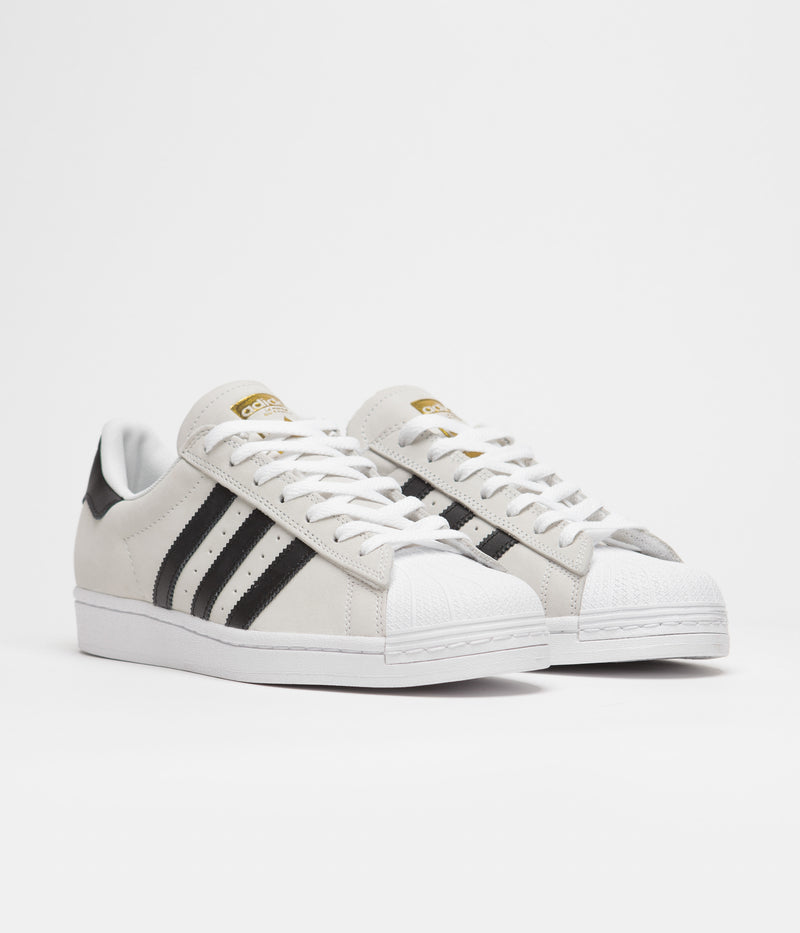 Adidas Superstar Shoes in White and Core Black / Gold Metallic